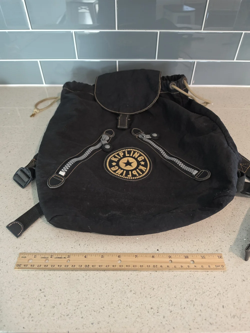 Vintage Kipling Black Canvas Drawstring Backpack with Gold Logo